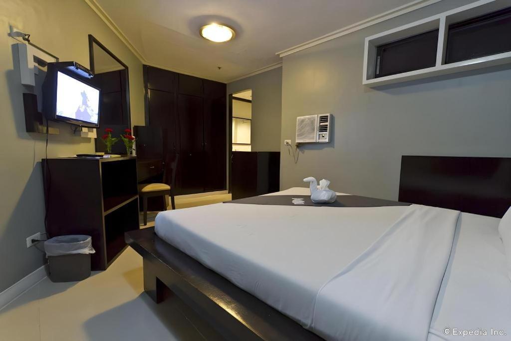 Richmond Plaza Hotel Tabok Kültér fotó