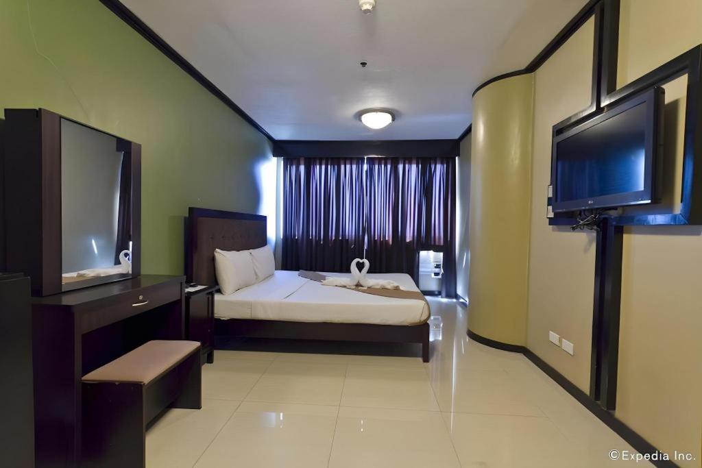 Richmond Plaza Hotel Tabok Kültér fotó