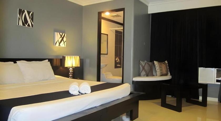 Richmond Plaza Hotel Tabok Kültér fotó