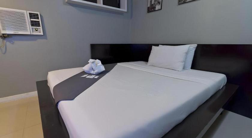 Richmond Plaza Hotel Tabok Kültér fotó