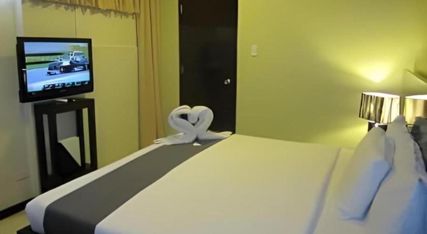 Richmond Plaza Hotel Tabok Kültér fotó