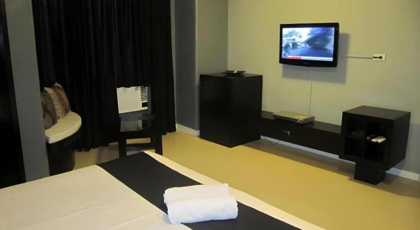 Richmond Plaza Hotel Tabok Kültér fotó