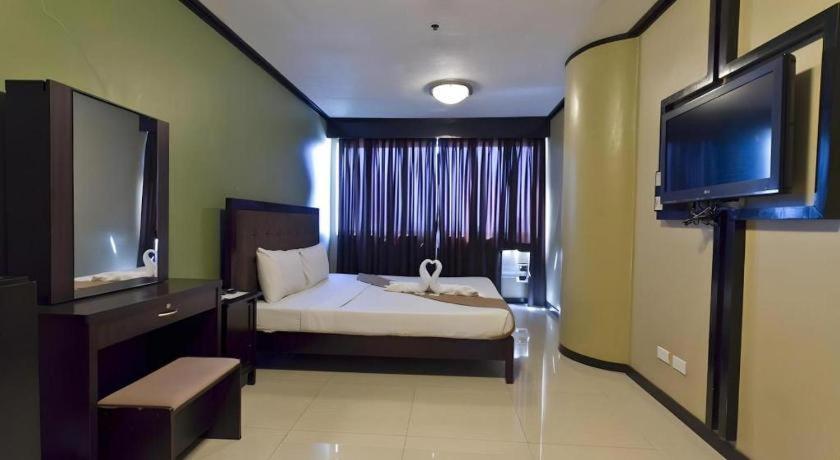 Richmond Plaza Hotel Tabok Kültér fotó
